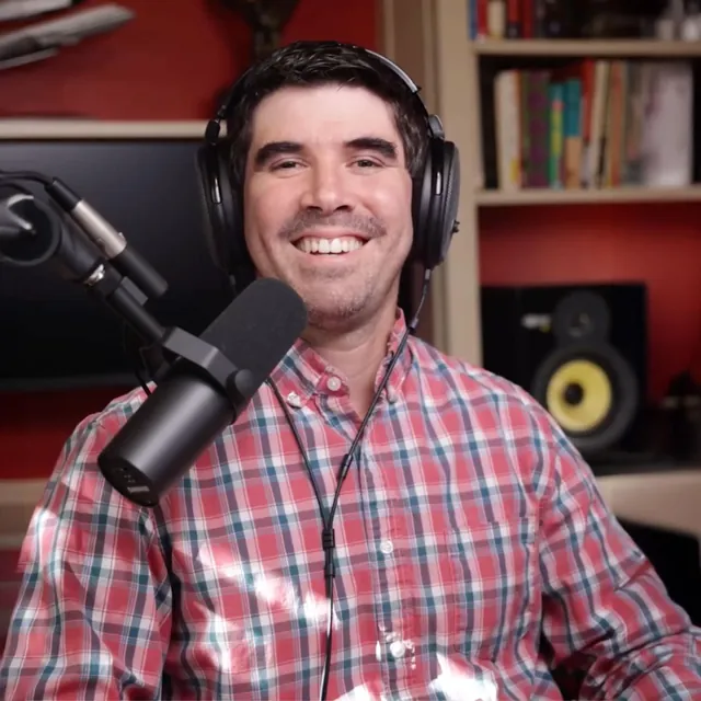 Armando J. Perez-Carreno, host of The Web Talk Show, at the mic in his studio